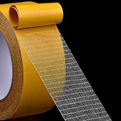 Detailed view of the mesh-backed adhesive tape roll