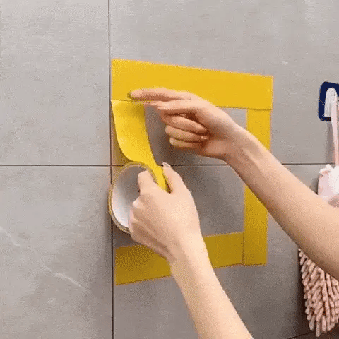 Peeling the protective liner for a household tape application