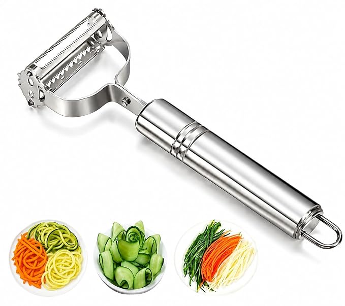 Stainless steel handheld peeler beside prepared vegetable strips on a white background