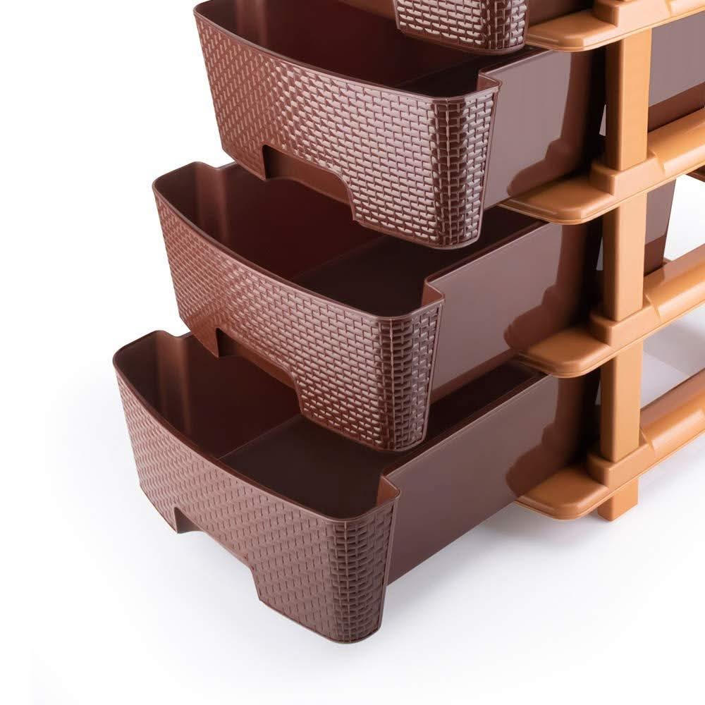 Brown plastic drawer storage unit with drawers open
