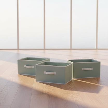 Set of four light gray storage boxes with white handles on a white background
